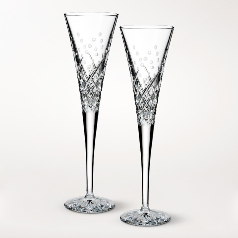 NEVER USED Waterford Champagne Flutes (set of 2)
in original box.